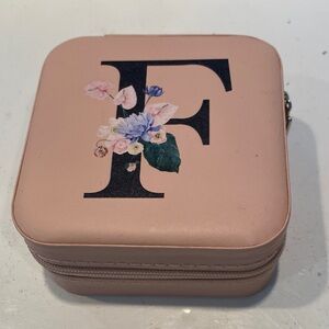 NWOT Pink Cushioned Leatherette Mini Zippered Jewel Case with Floral “F”